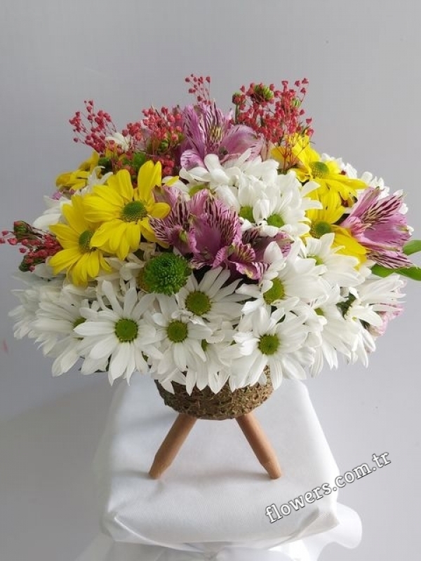 Wildflowers and White Roses In Vase
